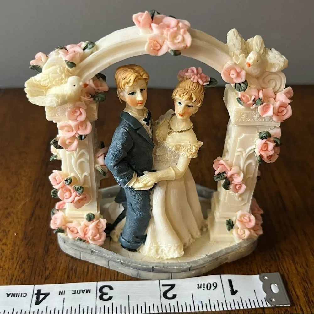 Vintage wedding cake topper. Romantic Wedding Couple Figurine with Pink Roses